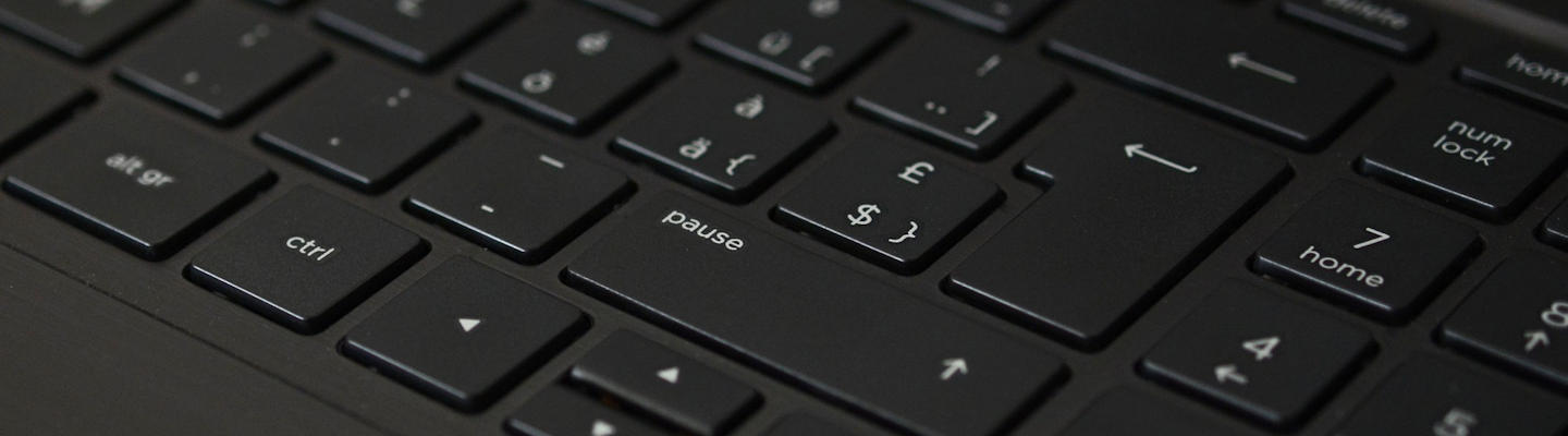Image of a black computer keyboard, representing how hackers caused the 2019 Capital One data breach.
