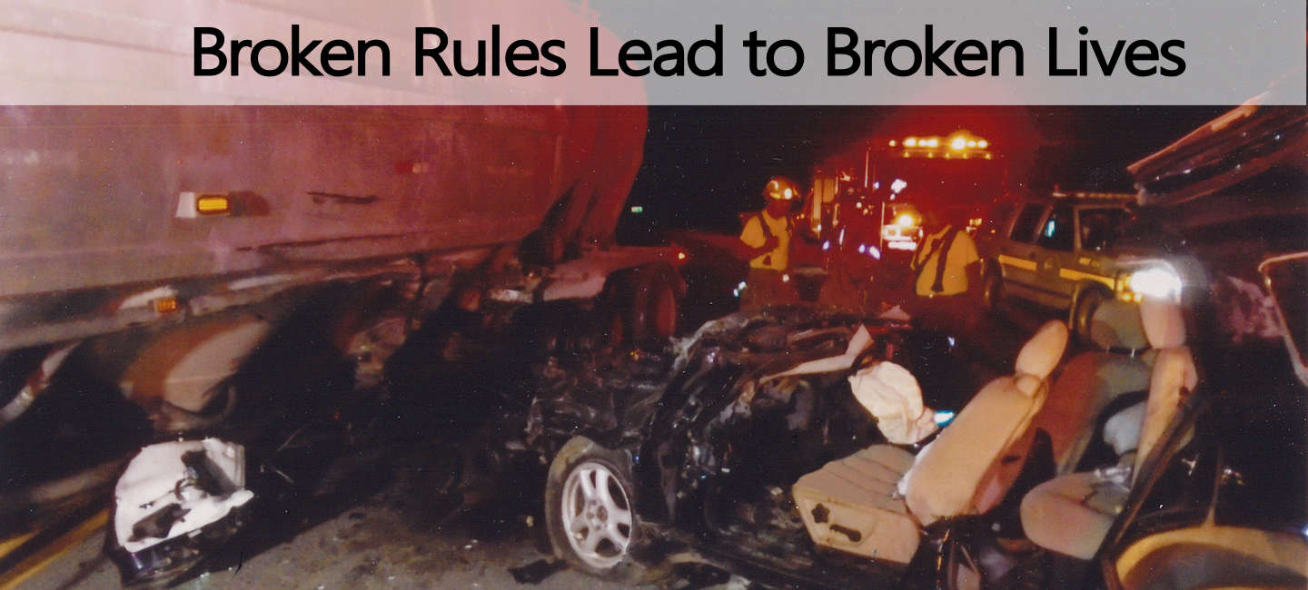 Image of an accident involving a semi, representing how the Law Offices of Kelly R. Reed can help with a WV trucking safety accident involving noncompliance with retroreflective tape requirements or other negligence.